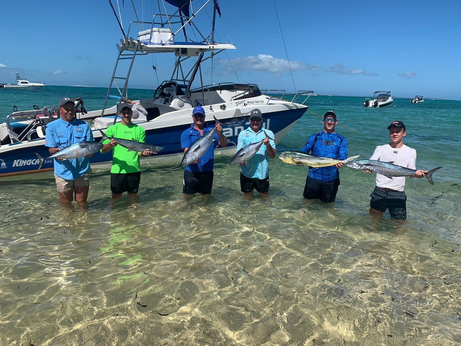 The day's catch back at the beach
