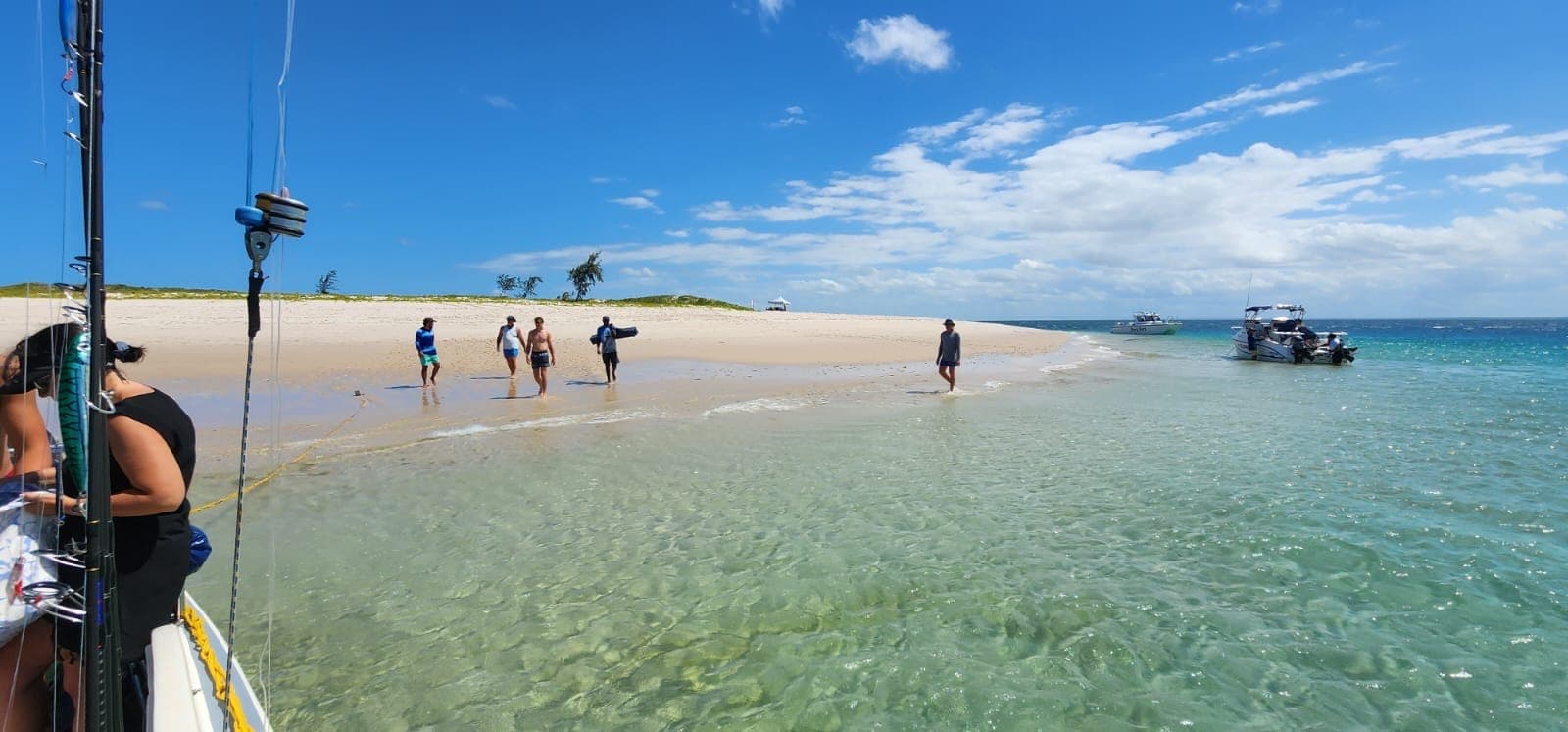 Strolling a white sandbank at low tide