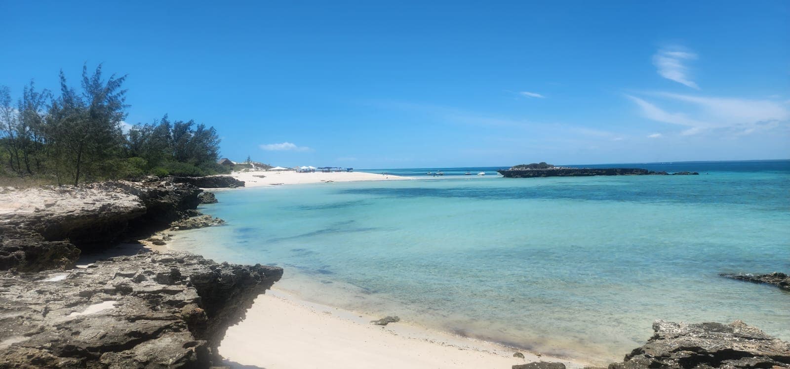 White sand cove with crystal-clear water