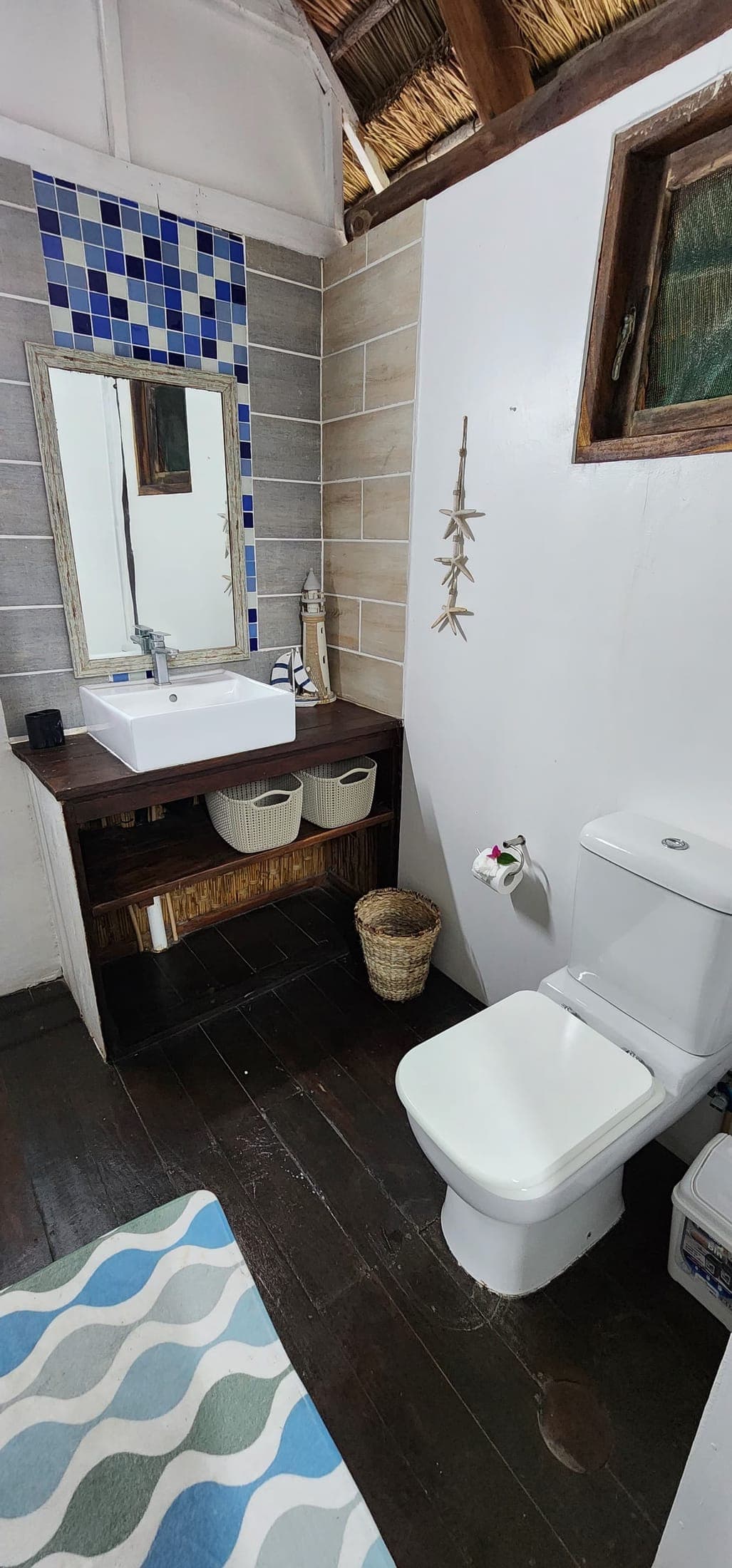 En-suite bathroom with mosaic tiles
