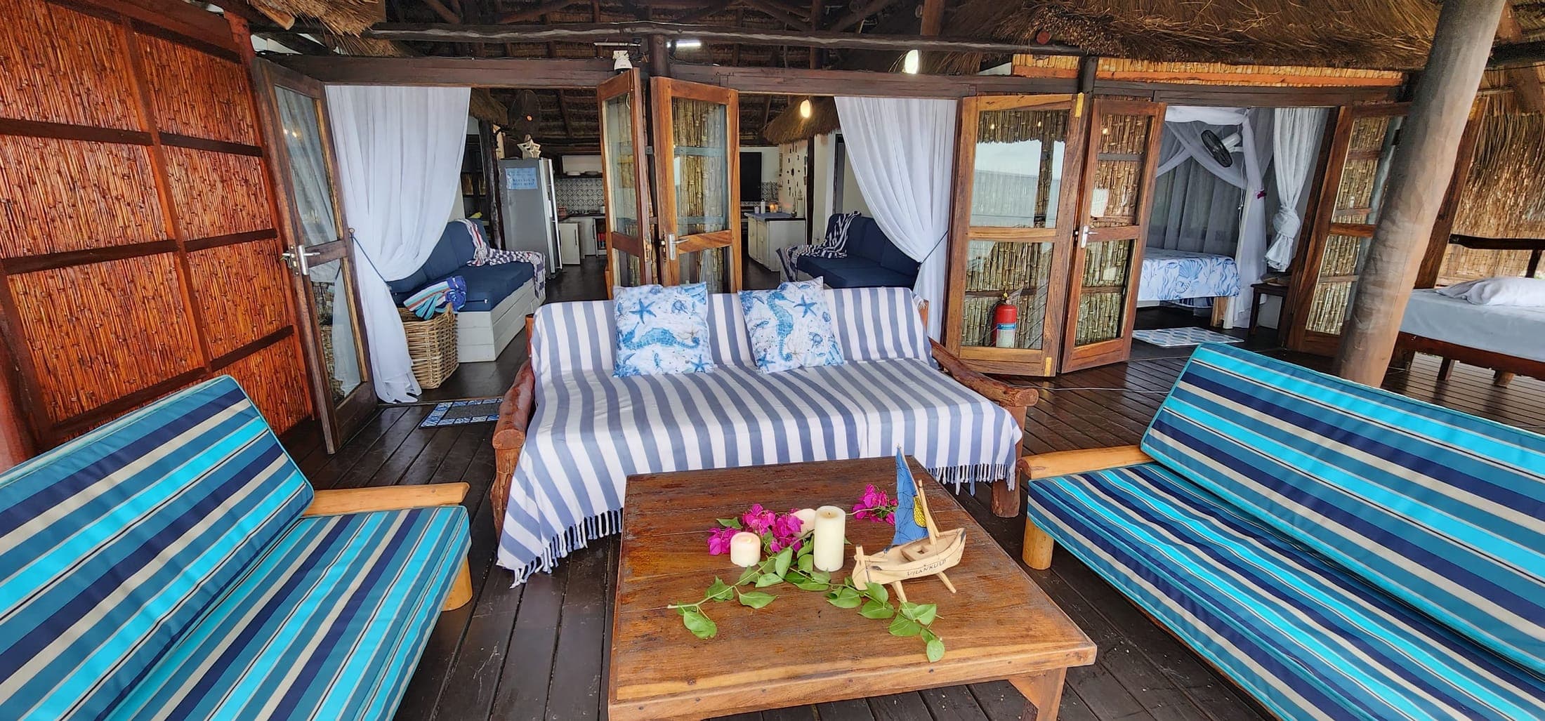 Casa living area opening onto the deck