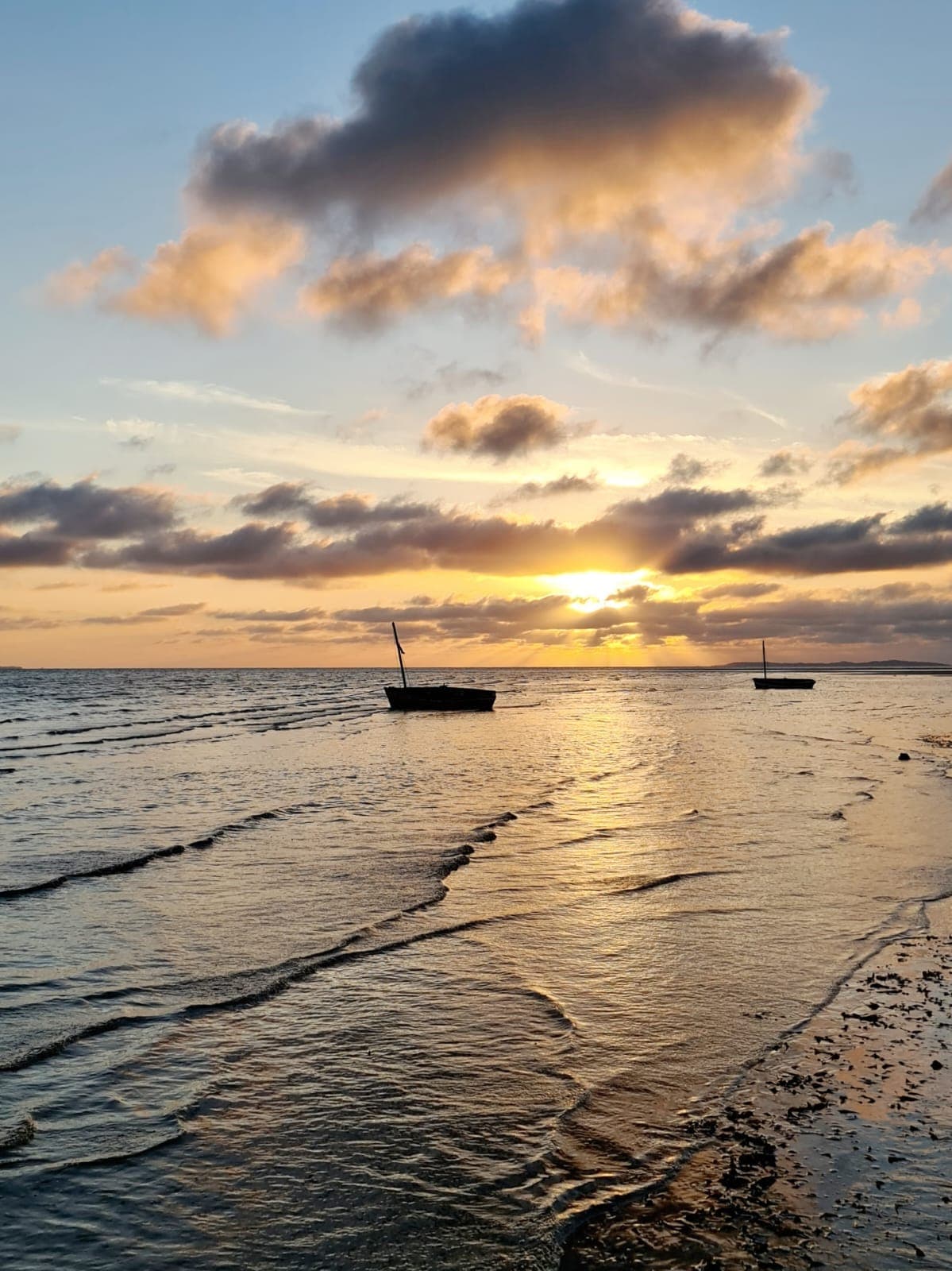 Dhow silhouetted against the evening sky